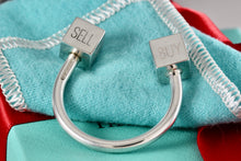 Load image into Gallery viewer, Tiffany &amp; Co. Silver BUY SELL HOLD Market Square Horseshoe Keychain Rare
