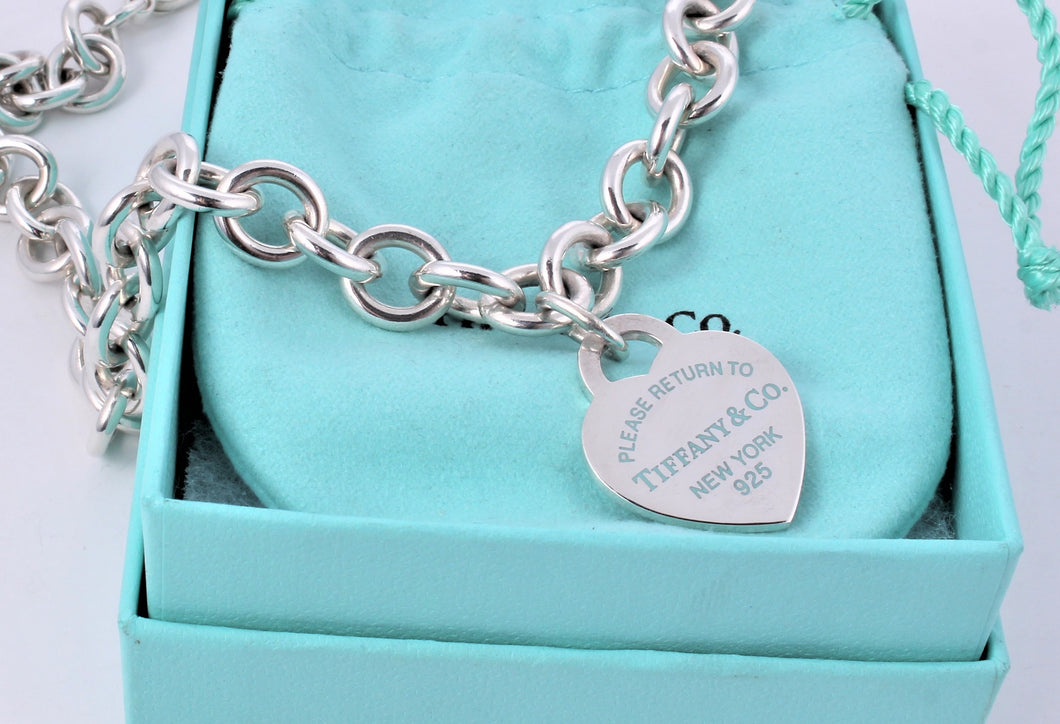 Return to Tiffany & Co. Silver Blue Enamel Lettering Heart Charm 16