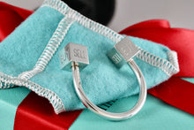 Load image into Gallery viewer, Tiffany &amp; Co. Silver BUY SELL HOLD Market Square Horseshoe Keychain Rare
