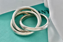 Load image into Gallery viewer, Tiffany &amp; Co. Silver Triple Interlocking Rings Size 4
