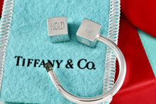 Load image into Gallery viewer, Tiffany &amp; Co. Silver BUY SELL HOLD Market Square Horseshoe Keychain Rare
