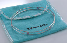 Load image into Gallery viewer, Tiffany &amp; Co. Elsa Peretti 18Kt. White Gold Pink Sapphire Color By The Yard Bangle Bracelet #C
