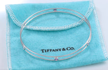Load image into Gallery viewer, Tiffany &amp; Co. Elsa Peretti 18Kt. White Gold Pink Sapphire Color By The Yard Bangle Bracelet #C
