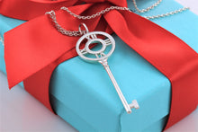 Load image into Gallery viewer, Tiffany &amp; Co. Atlas Silver Roman Numeral Key 2&quot; Pendant Necklace
