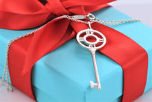 Load image into Gallery viewer, Tiffany &amp; Co. Atlas Silver Roman Numeral Key 2&quot; Pendant Necklace
