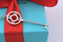 Load image into Gallery viewer, Tiffany &amp; Co. Atlas Silver Roman Numeral Key 2&quot; Pendant Necklace
