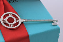 Load image into Gallery viewer, Tiffany &amp; Co. Atlas Silver Roman Numeral Key 2&quot; Pendant Necklace

