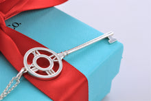 Load image into Gallery viewer, Tiffany &amp; Co. Atlas Silver Roman Numeral Key 2&quot; Pendant Necklace
