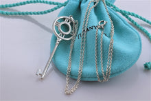 Load image into Gallery viewer, Tiffany &amp; Co. Atlas Silver Roman Numeral Key 2&quot; Pendant Necklace
