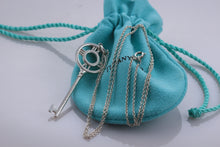Load image into Gallery viewer, Tiffany &amp; Co. Atlas Silver Roman Numeral Key 2&quot; Pendant Necklace
