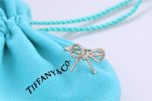 Load image into Gallery viewer, Tiffany &amp; Co. Silver Twist Rope Ribbon Ring Size 5.5
