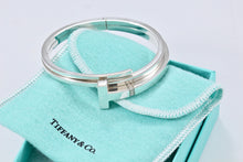 Load image into Gallery viewer, Tiffany &amp; Co. T Wrap Square Diamond Bangle Bracelet
