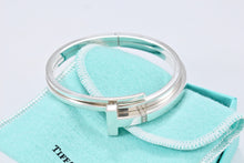 Load image into Gallery viewer, Tiffany &amp; Co. T Wrap Square Diamond Bangle Bracelet
