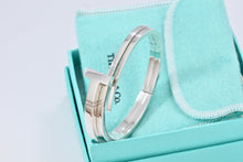 Load image into Gallery viewer, Tiffany &amp; Co. T Wrap Square Diamond Bangle Bracelet

