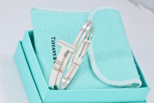 Load image into Gallery viewer, Tiffany &amp; Co. T Wrap Square Diamond Bangle Bracelet
