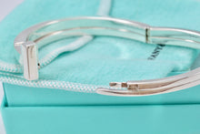 Load image into Gallery viewer, Tiffany &amp; Co. T Wrap Square Diamond Bangle Bracelet
