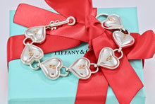 Load image into Gallery viewer, Tiffany &amp; Co. 18K Gold &amp; Silver Interlocking Heart Keyhole Padlocks Key Toggle Bracelet
