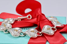 Load image into Gallery viewer, Tiffany &amp; Co. 18K Gold &amp; Silver Interlocking Heart Keyhole Padlocks Key Toggle Bracelet
