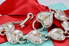 Load image into Gallery viewer, Tiffany &amp; Co. 18K Gold &amp; Silver Interlocking Heart Keyhole Padlocks Key Toggle Bracelet
