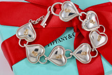 Load image into Gallery viewer, Tiffany &amp; Co. 18K Gold &amp; Silver Interlocking Heart Keyhole Padlocks Key Toggle Bracelet
