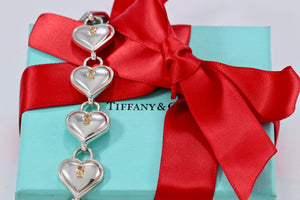 Tiffany & Co. 18K Gold & Silver Interlocking Heart Keyhole Padlocks Key Toggle Bracelet