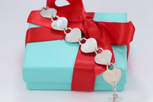 Load image into Gallery viewer, Tiffany &amp; Co. 18K Gold &amp; Silver Interlocking Heart Keyhole Padlocks Key Toggle Bracelet
