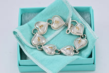 Load image into Gallery viewer, Tiffany &amp; Co. 18K Gold &amp; Silver Interlocking Heart Keyhole Padlocks Key Toggle Bracelet
