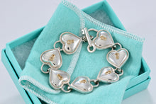 Load image into Gallery viewer, Tiffany &amp; Co. 18K Gold &amp; Silver Interlocking Heart Keyhole Padlocks Key Toggle Bracelet
