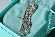 Load image into Gallery viewer, Tiffany &amp; Co. 18k Gold &amp; Silver Figaro Cuban Link 7&quot; Bracelet
