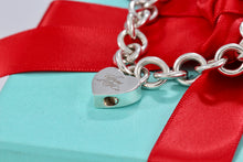 Load image into Gallery viewer, Tiffany &amp; Co. Silver Notes &quot;Tiffany &amp; Co.&quot; Heart Padlock Charm Bracelet

