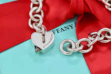 Load image into Gallery viewer, Tiffany &amp; Co. Silver Notes &quot;Tiffany &amp; Co.&quot; Heart Padlock Charm Bracelet
