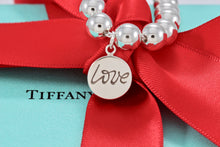 Load image into Gallery viewer, Tiffany &amp; Co. Paloma Picasso Silver Graffiti &quot;LOVE&quot; Circle Tag 8mm Bead Bracelet
