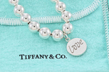 Load image into Gallery viewer, Tiffany &amp; Co. Paloma Picasso Silver Graffiti &quot;LOVE&quot; Circle Tag 8mm Bead Bracelet
