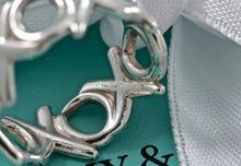 Load image into Gallery viewer, Tiffany &amp; Co. Paloma Picasso Silver xoxo Wide Band Ring
