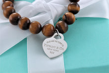 Load image into Gallery viewer, Return To Tiffany &amp; Co. Silver Tiger Eye Heart Charm 8mm Beaded Bracelet
