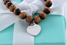 Load image into Gallery viewer, Return To Tiffany &amp; Co. Silver Tiger Eye Heart Charm 8mm Beaded Bracelet
