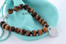 Load image into Gallery viewer, Return To Tiffany &amp; Co. Silver Tiger Eye Heart Charm 8mm Beaded Bracelet
