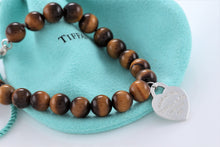 Load image into Gallery viewer, Return To Tiffany &amp; Co. Silver Tiger Eye Heart Charm 8mm Beaded Bracelet
