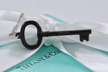 Load image into Gallery viewer, Tiffany &amp; Co. Silver &amp; Titanium Oval Key Pendant Necklace
