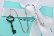 Load image into Gallery viewer, Tiffany &amp; Co. Silver &amp; Titanium Oval Key Pendant Necklace
