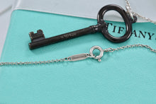 Load image into Gallery viewer, Tiffany &amp; Co. Silver &amp; Titanium Oval Key Pendant Necklace
