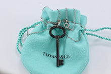 Load image into Gallery viewer, Tiffany &amp; Co. Silver &amp; Titanium Oval Key Pendant Necklace
