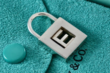 Load image into Gallery viewer, Tiffany &amp; Co. Silver Letter &quot;E&quot; Padlock Pendant
