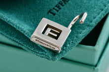 Load image into Gallery viewer, Tiffany &amp; Co. Silver Letter &quot;E&quot; Padlock Pendant
