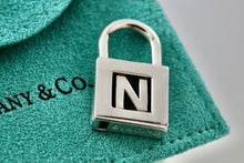 Load image into Gallery viewer, Tiffany &amp; Co. Silver Letter &quot;N&quot; Padlock Pendant
