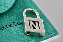 Load image into Gallery viewer, Tiffany &amp; Co. Silver Letter &quot;N&quot; Padlock Pendant
