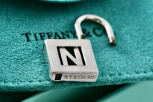 Load image into Gallery viewer, Tiffany &amp; Co. Silver Letter &quot;N&quot; Padlock Pendant
