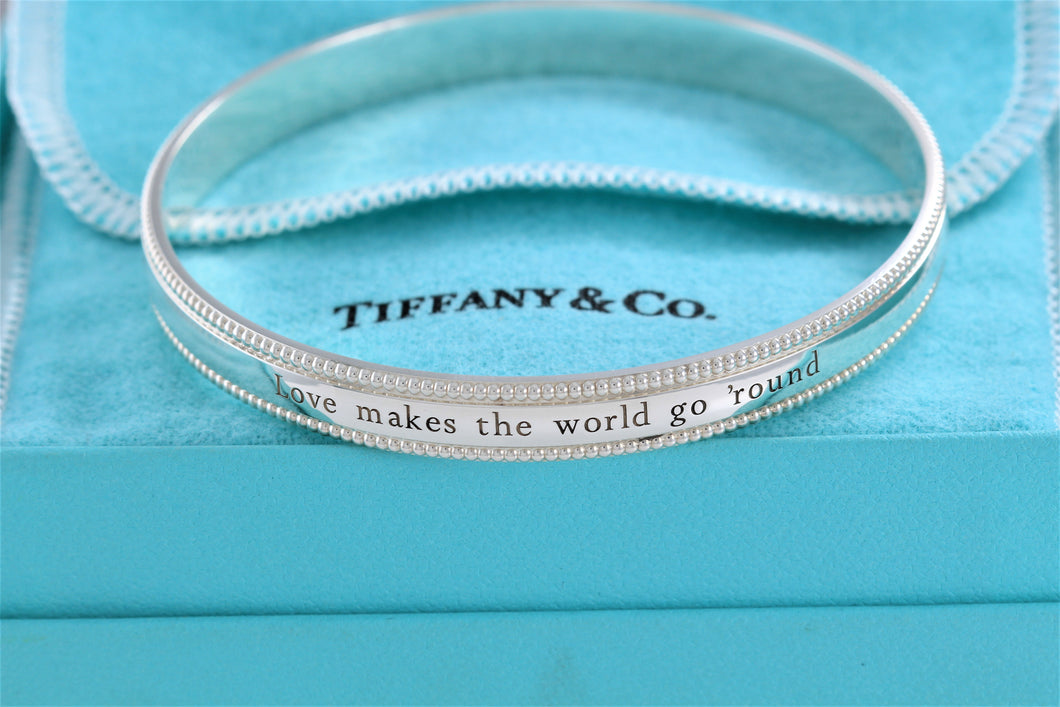 Tiffany & Co. Silver Yours ''Love Makes The World Go Round'' Beaded Edge Bangle Bracelet