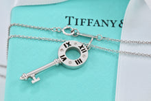 Load image into Gallery viewer, Tiffany &amp; Co. Atlas 18K White Gold 4 Diamond Circle Key Pendant Necklace
