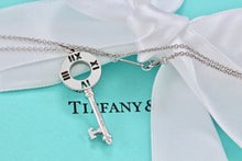 Load image into Gallery viewer, Tiffany &amp; Co. Atlas 18K White Gold 4 Diamond Circle Key Pendant Necklace
